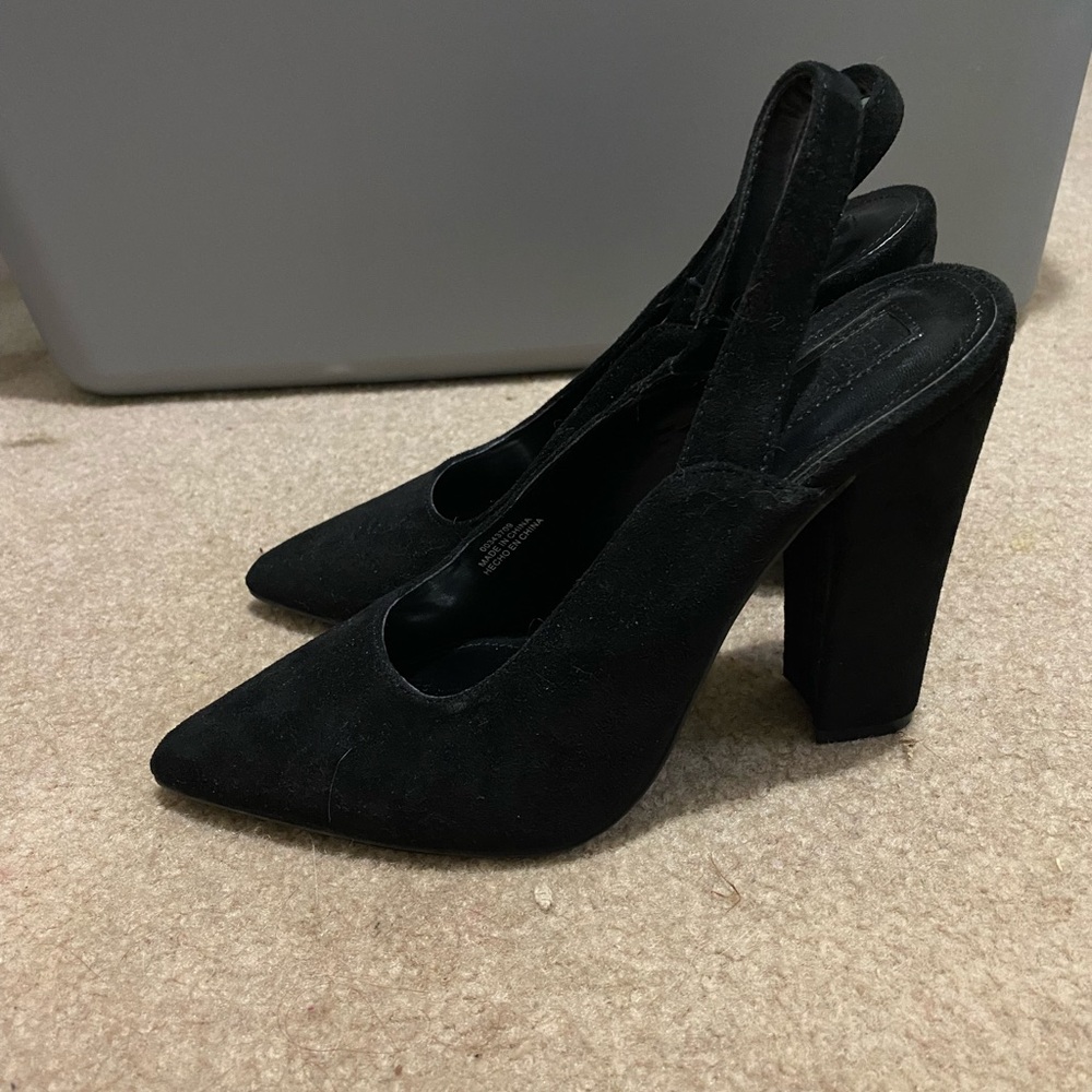 Black pointed toe heels